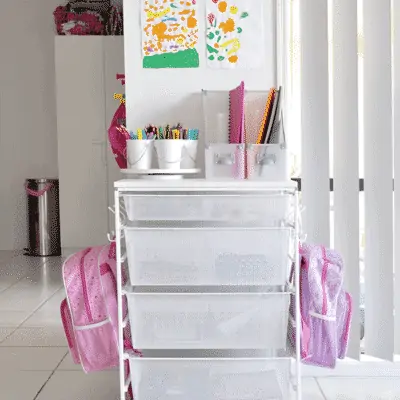 organize your child's backpack, school supplies, shoes and jackets with a dedicated backpack station. 9 backpack organization ideas for when you do't have a mudroom in your home.