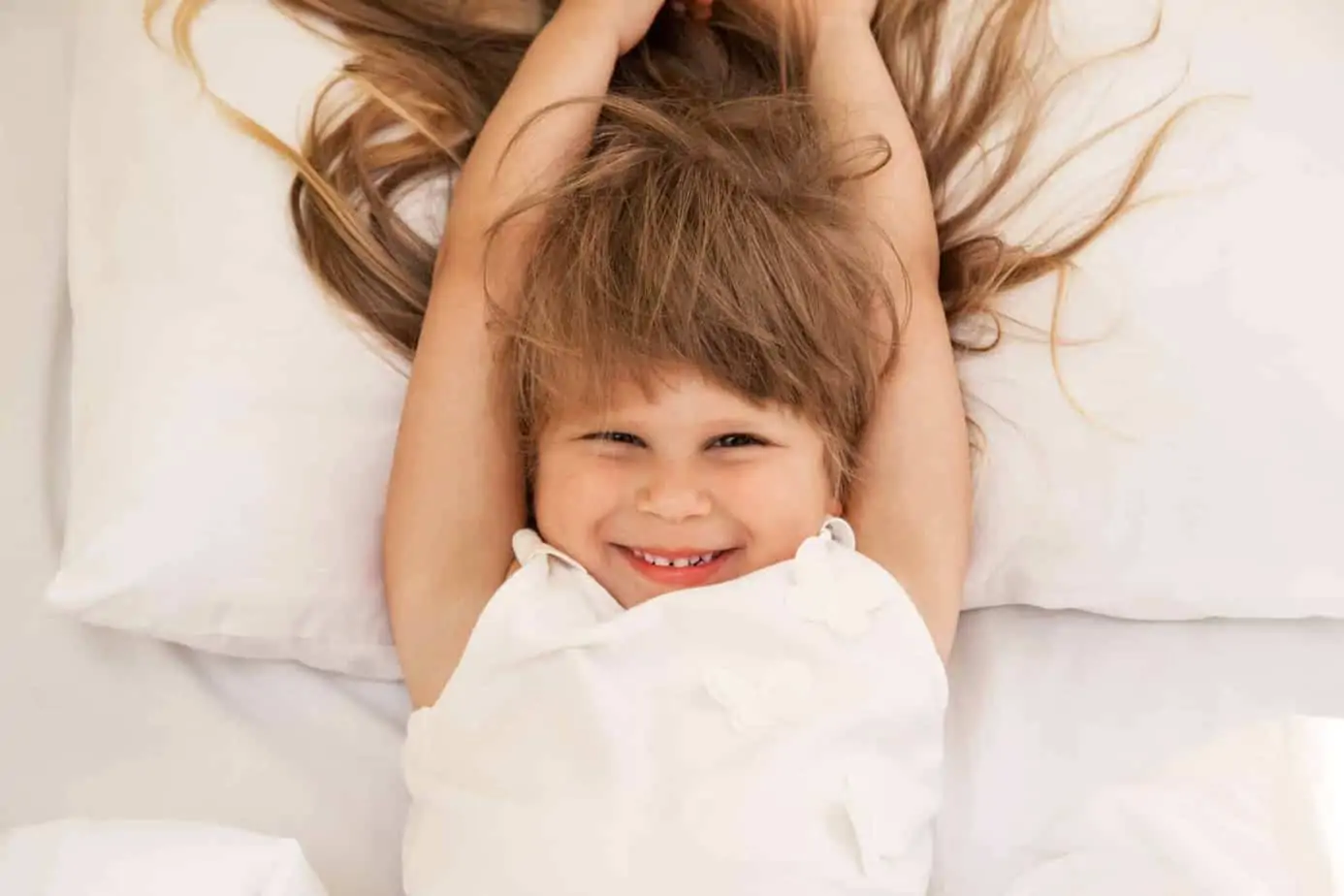 Sleep problems are tough, particularly if you're dealign with the 18 month sleep regression, new nighttime fears, or an energized toddler who refuses to go along with bedtime as usual. Here are helpful solutions to common sleep struggles including sleep regressions and tips to get your child's sleep back on track.