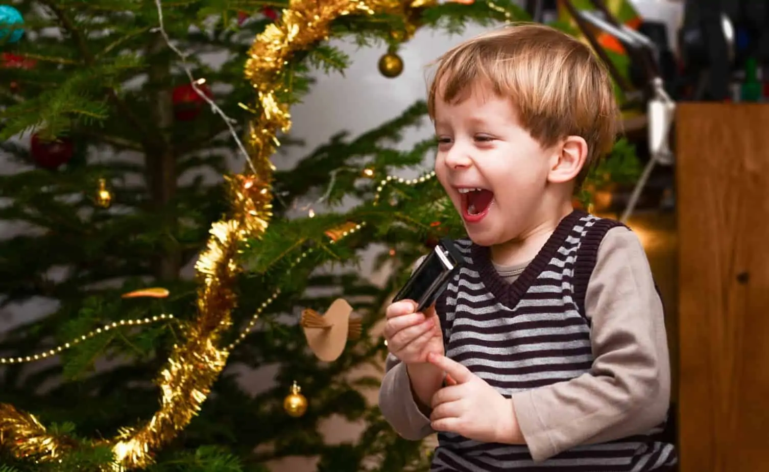 child excited for christmas scavenger hunt