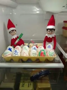 elf on the shelf caught coloring eggs