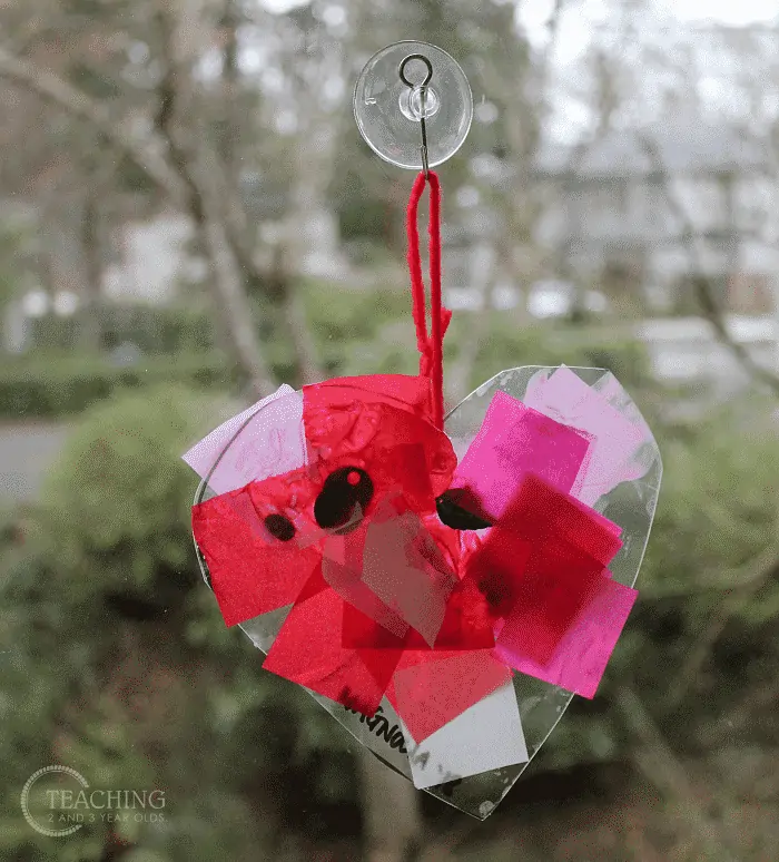 plastic heart suncatcher valentines day craft for toddlers